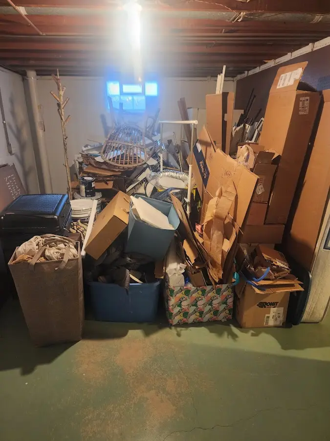 Roll-off dumpster container at job site for 8 Yard Dumpster Rental in Fort Lewis